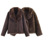 Front and reverse views of the reversible faux fur jacket laid flat, showing the smooth dark brown suede-like side and the full faux fur exterior side side by side