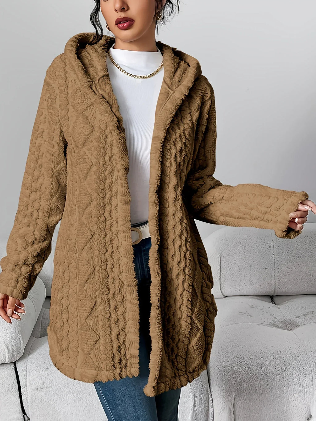 Front view of the open-front hooded cardigan in camel brown showing the oversized silhouette, long sleeves, attached hood and midi length